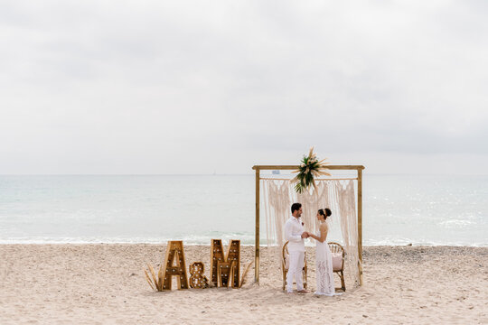 Marriage celebrating the wedding on the beach