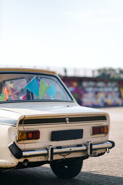 Vintage car with festive flags to celebrate