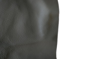 Gray leather pieces isolated on white background. Genuine leather material. Raw materials for making accessories, shoes and clothes made of genuine leather
