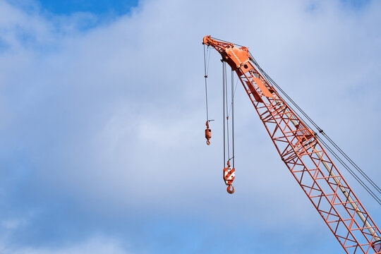 Large industrial crane masts at gas site