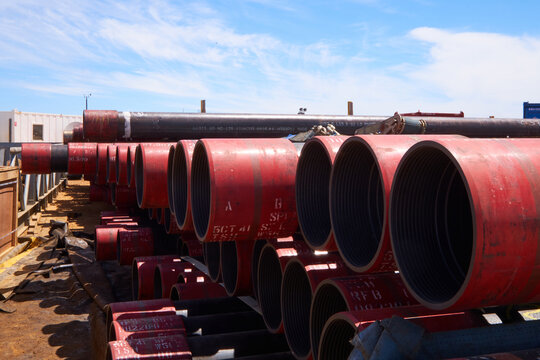 Drilling rod encasements at drilling site