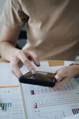 A businesswoman completes KYC using an online banking program in order to open a digital savings account. The definition of cyber security.