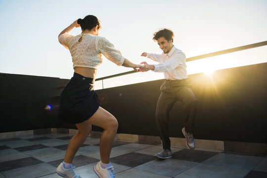 Partner dancing in a terrace