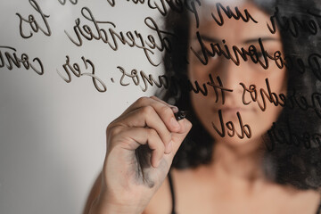 Female Artist Doing Calligraphy on Glass
