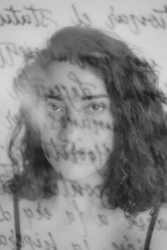 Portrait of Woman Through Glass With Handwriting