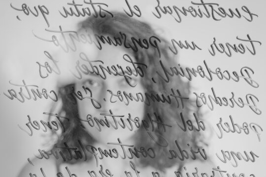 Portrait of Woman Through Glass With Handwriting