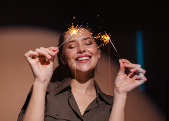 Cheerful model with sparklers 