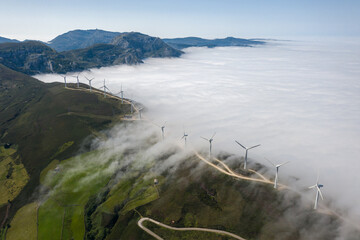 a sea of clouds at a wind farm