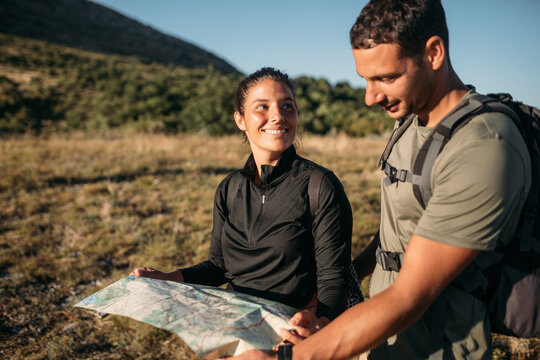 Couple Looking at Trail Map