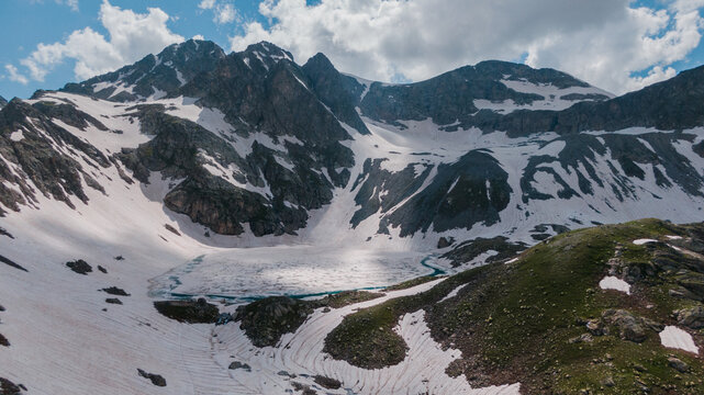 alpine idyllic landscape, snow covered slopes