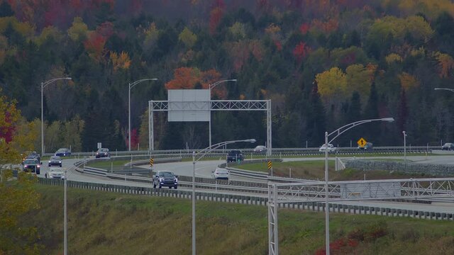 cars speeding on the highway fast interchange time lapse road in Sherbrooke Quebec Canada