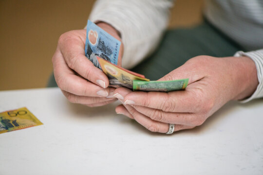 man counting money