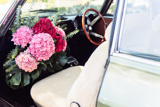 Flower bouquet in old car