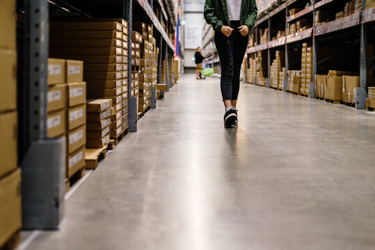 person walking in warehouse