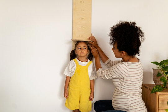 Measurements Of A Kid's Height On The Wall