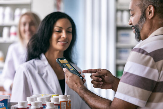 RX: Customer Discusses Information On Smart Phone