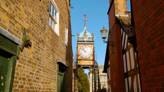 Walk along the Eastgate and Eastgate Clock in Chester, Cheshire, England, UK, on the site of Roman entrance of Deva Victrix