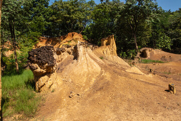 Obraz premium Within a national park named Phae Mueang Phi caused by the terrain which is the soil and sandstone was naturally eroded into various shapes that are In Phrae Province of Thailand.
