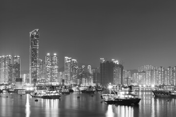 Panorama of harbor of Hong Kong city at night
