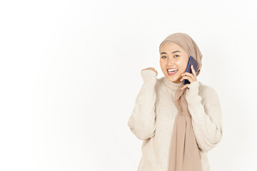 Talking on the Phone with happy expression of Beautiful Asian Woman Wearing Hijab Isolated On White Background