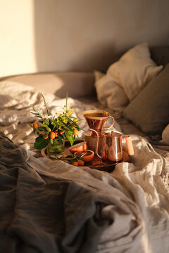 Coffee in copper dripper served in bed