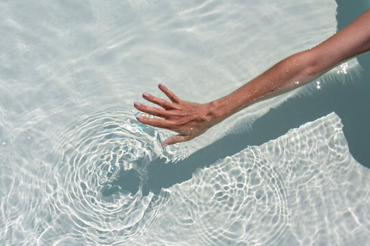 Hand touch water