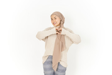 Showing Heart or Love Sign of Beautiful Asian Woman Wearing Hijab Isolated On White Background