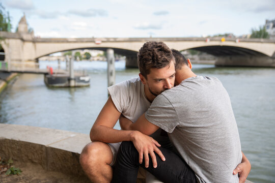 Men Couple Holding Each Other Outdoors