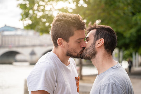 Gay Couple Kissing Each Other Outdoors