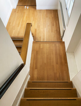 stairs in building with wooden floor