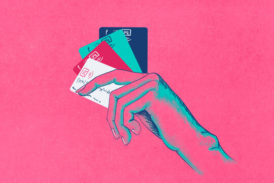 Hand Holding Credit Cards