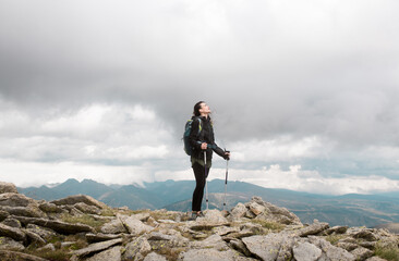Trekker breathing the fresh air of the mountain