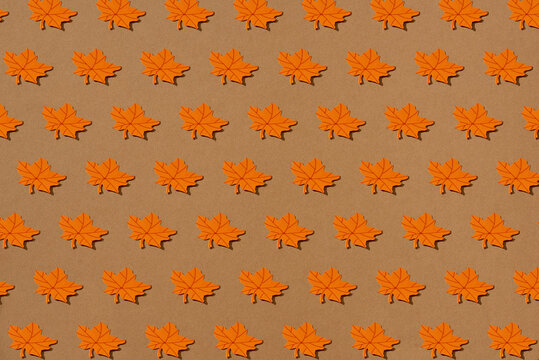 Seamless vector pattern with papercut autumn leaves
