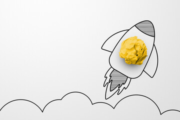 Rocket sketch drawing cartoon with crumpled paper ball on white background. Successful business...