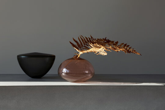 Handmade glass vases with dried fern leaf