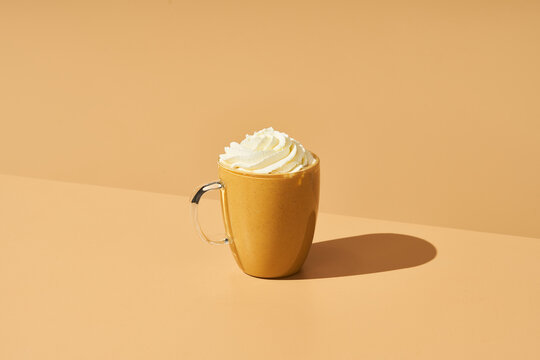 Mug of coffee with whipped cream