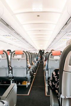 Passengers in cabin of plane