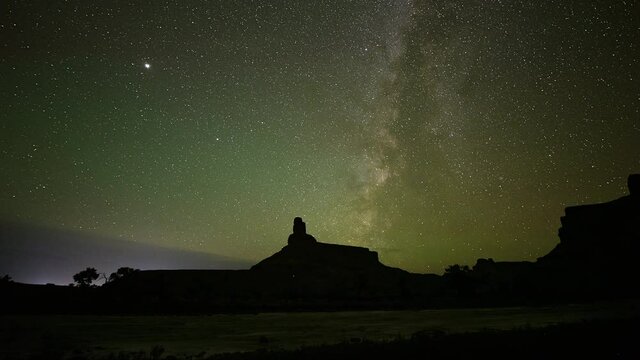 Time lapse of airglow in the nights sky viewing the milky way over the Utah desert as the stars and galaxy turn.