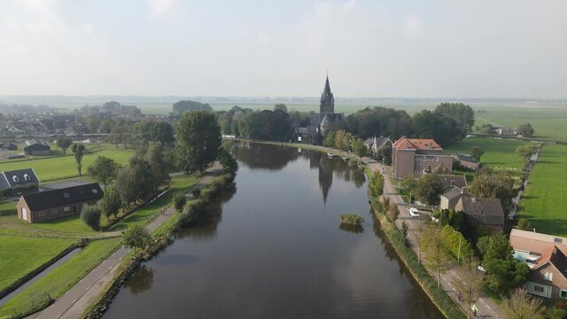 Aerial view of Amstelveen Oudekerk ad Amstel typical dutch landscape and historic village along the Amstel river in The Netherlands.