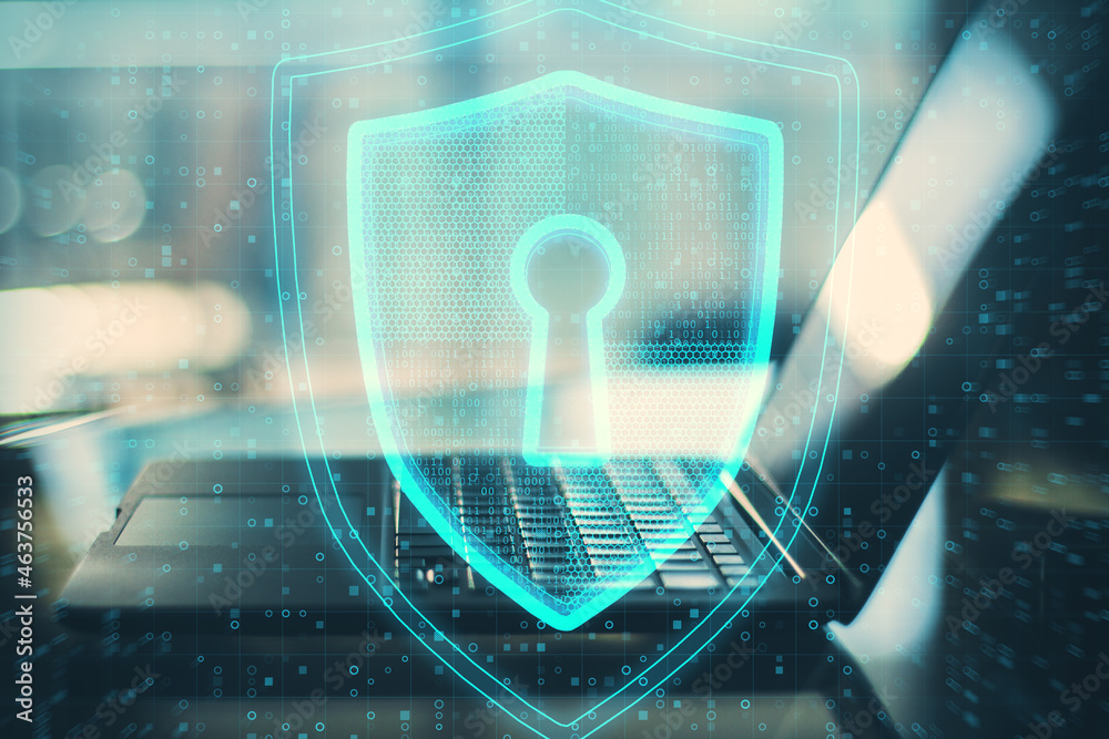 Poster close up of laptop with glowing shield and padlock hud on blurry background. safety and security con