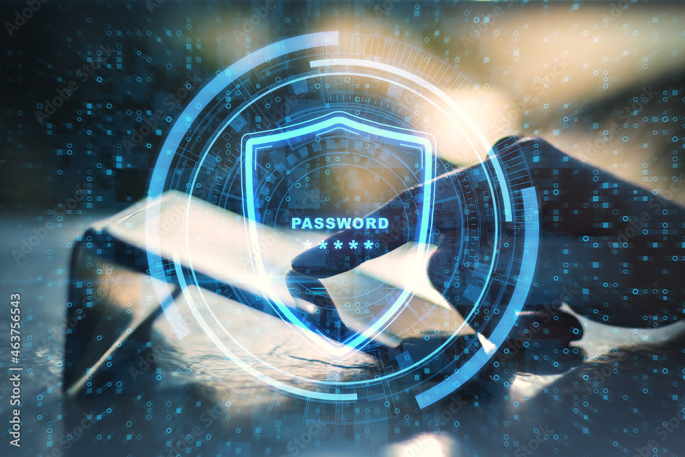 Poster close up of hands pointing at tablet with glowing protection shield on blurry outdoor background. lo