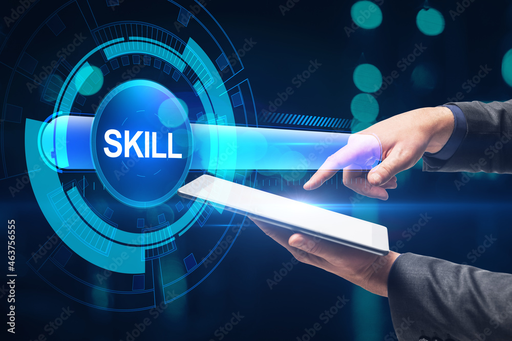 Poster close up of businessman hand pointing at tablet with creative digital skill bar on blurry dark bokeh