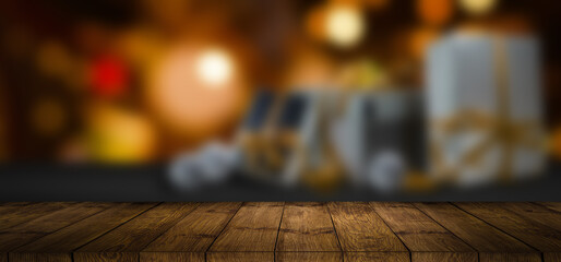 wood table with blured gifts bokeh background