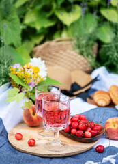 Set for picnic on blanket in lavender field