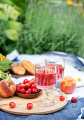 Set for picnic on blanket in lavender field