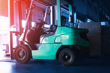 Fototapeta na wymiar Forklift Tractor Loader Parked at the Warehouse. 