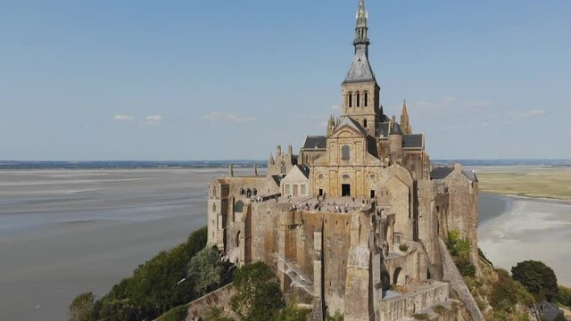 Mont St Michel touristic attraction of northern France in retro style - Famous historic place of French culture retro shoot (aerial photography)