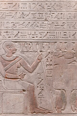 Egyptian hieroglyphs and ancient drawings on clay tablets and papyri background. The art of Egypt and the ancient civilizations of Africa.