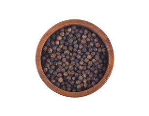 Black pepper peppercorns in wooden bowl isolated on white background. Top view.