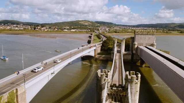Elevated view of the Conwy Suspension Bridge, Conwy Railway Bridge and Conwy Road Bridge, in North Wales, UK